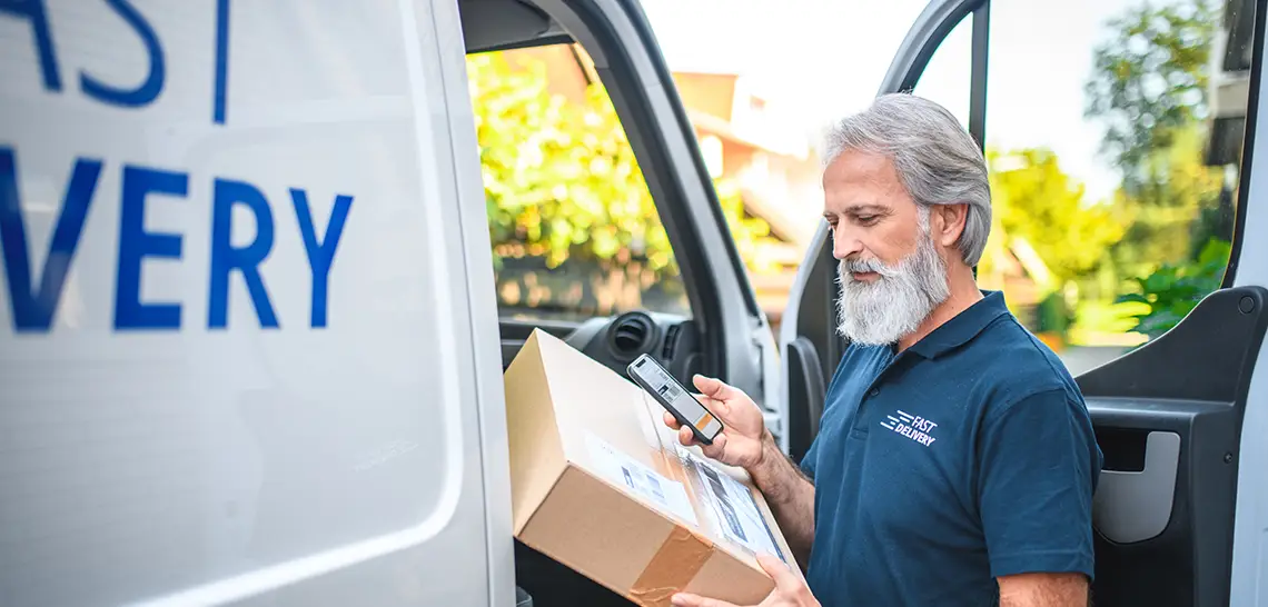 Transportation industry worker making delivery