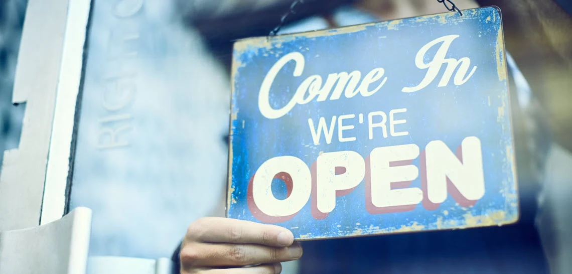 Come in We're Open sign at restaurant safety 